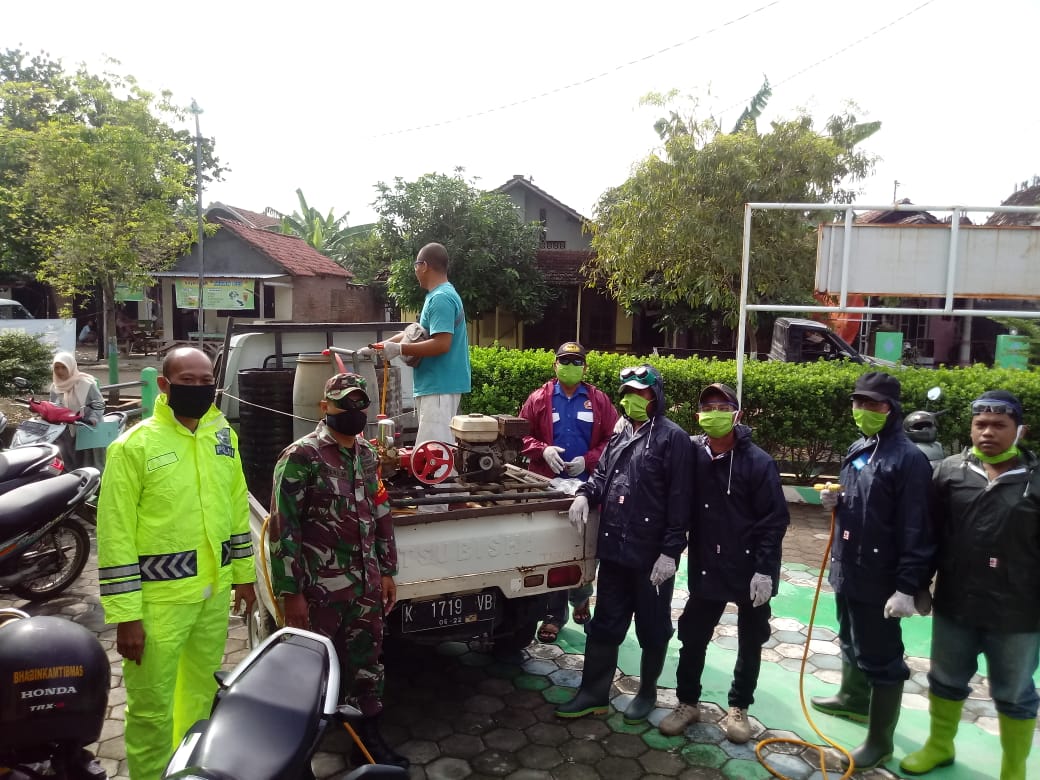 Satgas TMMD Bersama Warga Rapatkan Barisan Gempur COVID -19