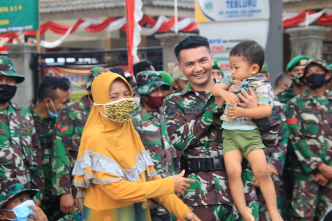 Senyum Masyarakat, Senyum Satgas TMMD Kodim Lamongan.