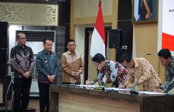 Pj Gubernur Agus Fatoni Tandatangani NPHD Sukseskan Pemilukada Serentak 2024